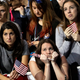 Supporters watch the election results on a larger television monitor during Democratic presidential nominee Hillary Clinton's election night rally in the Jacob Javits Center glass enclosed lobby in New York, Tuesday, Nov. 8, 2016.